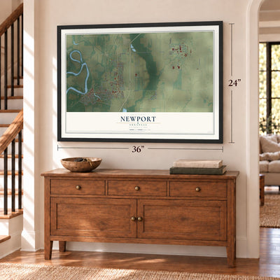 Newport, Arkansas map, 24 x 36 inch print in a black frame above a dresser by a staircase