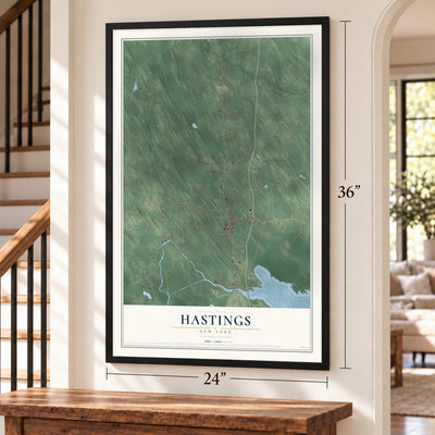 Hastings, New York map, 24 x 36 inch print in a black frame by a staircase