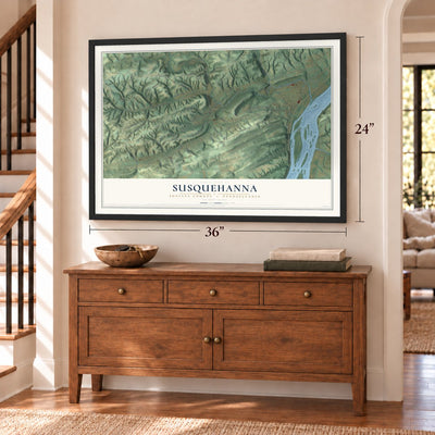 Susquehanna, Juniata County, Pennsylvania map, 24 x 36 inch print in a black frame above a dresser by a staircase