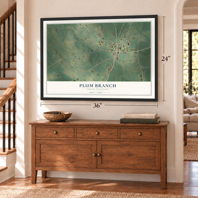 Plum Branch, South Carolina map, 24 x 36 inch print in a black frame above a dresser by a staircase