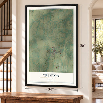 Trenton, Texas map, 24 x 36 inch print in a black frame by a staircase