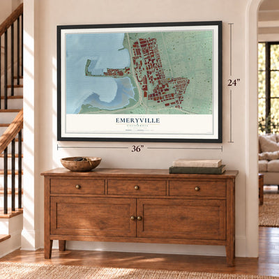 Emeryville, California map, 24 x 36 inch print in a black frame above a dresser by a staircase