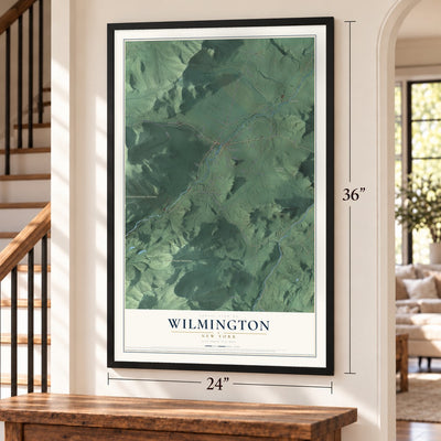 Wilmington, New York map, 24 x 36 inch print in a black frame by a staircase