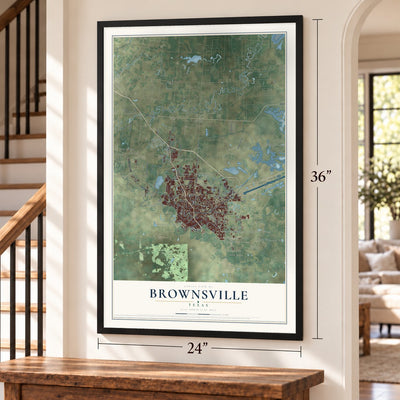 Brownsville, Texas map, 24 x 36 inch print in a black frame by a staircase