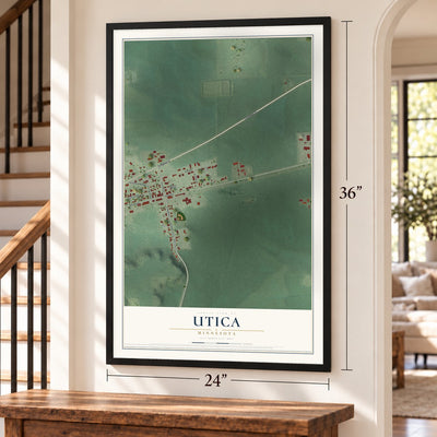 Utica, Minnesota map, 24 x 36 inch print in a black frame by a staircase