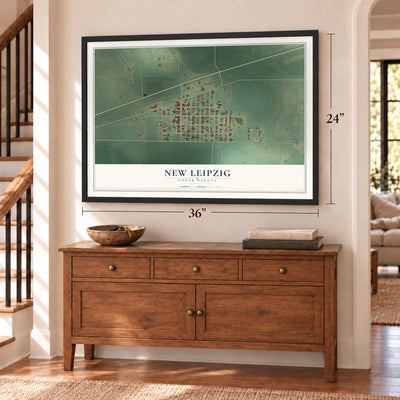 New Leipzig, North Dakota map, 24 x 36 inch print in a black frame above a dresser by a staircase