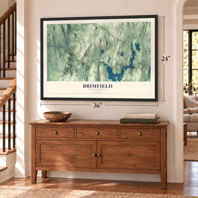 Brimfield, Massachusetts map, 24 x 36 inch print in a black frame above a dresser by a staircase