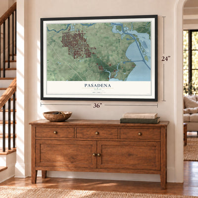 Pasadena, Texas map, 24 x 36 inch print in a black frame above a dresser by a staircase