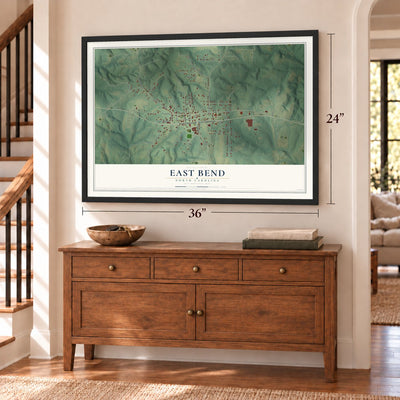 East Bend, North Carolina map, 24 x 36 inch print in a black frame above a dresser by a staircase