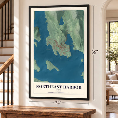Northeast Harbor, Maine map, 24 x 36 inch print in a black frame by a staircase