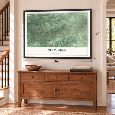 Melbourne, Arkansas map, 24 x 36 inch print in a black frame above a dresser by a staircase