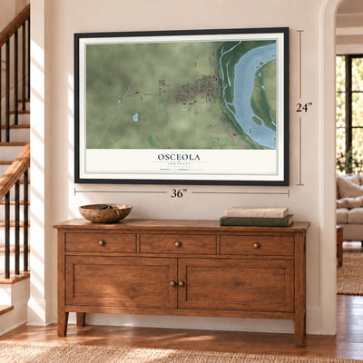 Osceola, Arkansas map, 24 x 36 inch print in a black frame above a dresser by a staircase