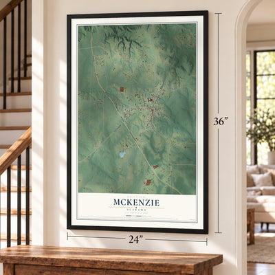 McKenzie, Alabama map, 24 x 36 inch print in a black frame by a staircase
