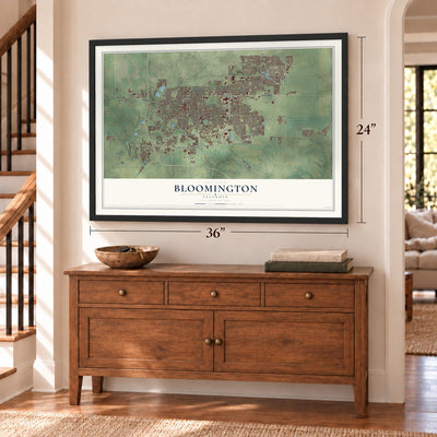 Bloomington, Illinois map, 24 x 36 inch print in a black frame above a dresser by a staircase