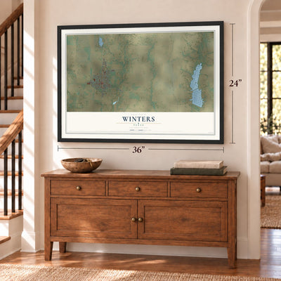 Winters, Texas map, 24 x 36 inch print in a black frame above a dresser by a staircase