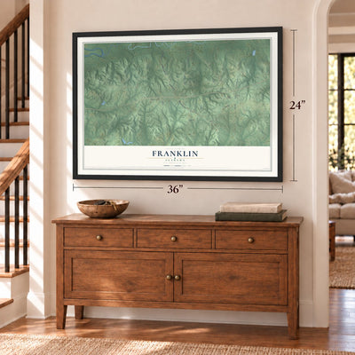 Franklin, Alabama map, 24 x 36 inch print in a black frame above a dresser by a staircase