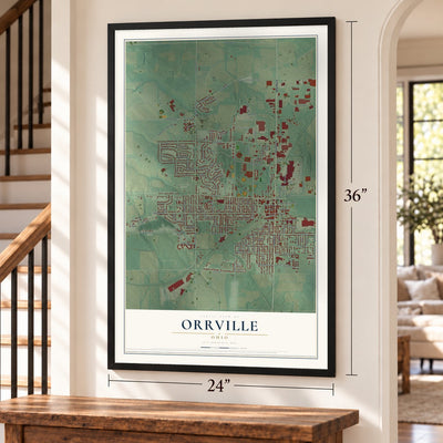 Orrville, Ohio map, 24 x 36 inch print in a black frame by a staircase