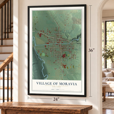 Village of Moravia, New York map, 24 x 36 inch print in a black frame by a staircase