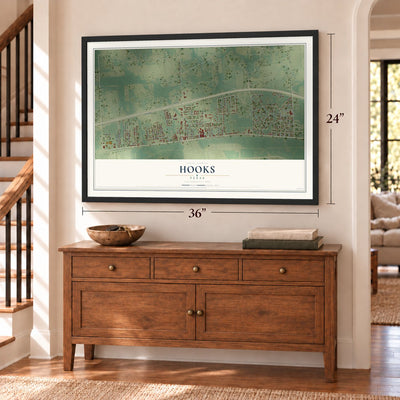 Hooks, Texas map, 24 x 36 inch print in a black frame above a dresser by a staircase