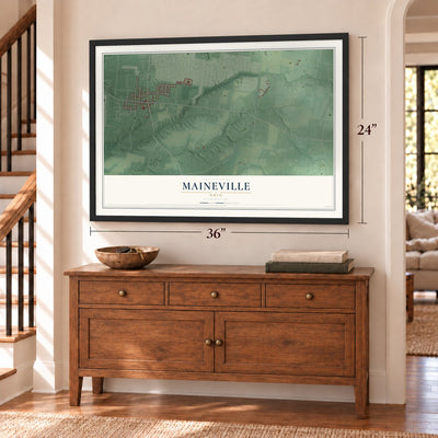 Maineville, Ohio map, 24 x 36 inch print in a black frame above a dresser by a staircase