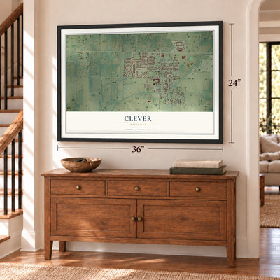 Clever, Missouri map, 24 x 36 inch print in a black frame above a dresser by a staircase