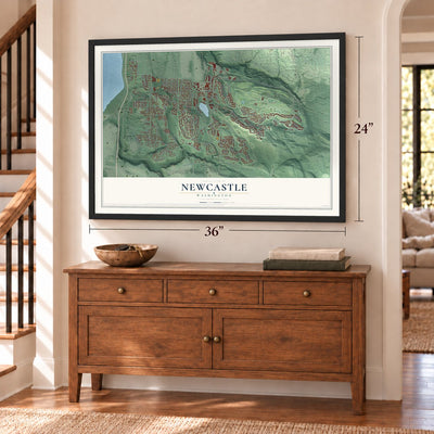 Newcastle, Washington map, 24 x 36 inch print in a black frame above a dresser by a staircase