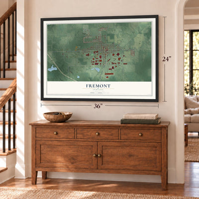 Fremont, Indiana map, 24 x 36 inch print in a black frame above a dresser by a staircase