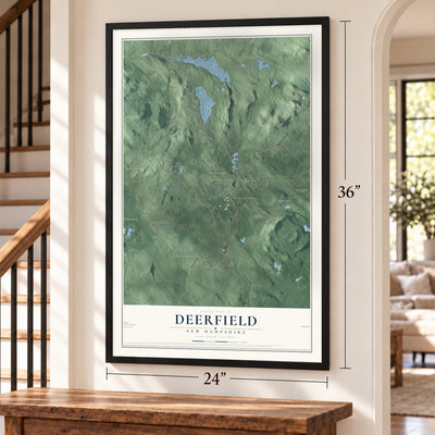 Deerfield, New Hampshire map, 24 x 36 inch print in a black frame by a staircase