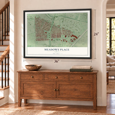 Meadows Place, Texas map, 24 x 36 inch print in a black frame above a dresser by a staircase