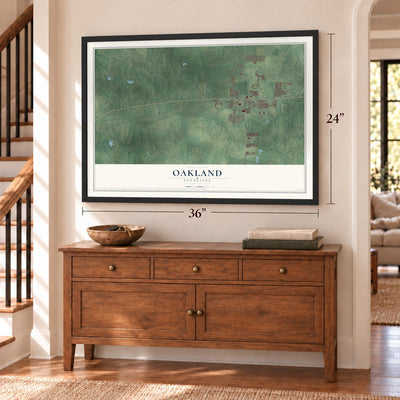 Oakland, Tennessee map, 24 x 36 inch print in a black frame above a dresser by a staircase