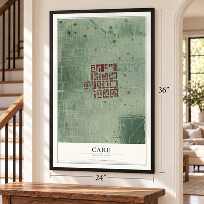 CARE, Maryland map, 24 x 36 inch print in a black frame by a staircase