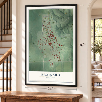 Brainard, Nebraska map, 24 x 36 inch print in a black frame by a staircase