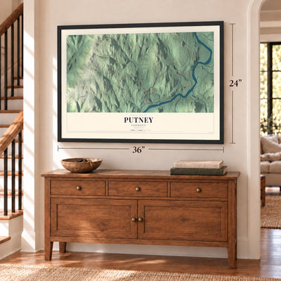 Putney, Vermont map, 24 x 36 inch print in a black frame above a dresser by a staircase