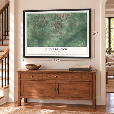 Olive Branch, Mississippi map, 24 x 36 inch print in a black frame above a dresser by a staircase