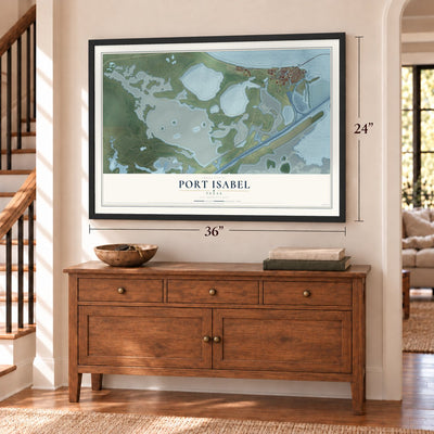 Port Isabel, Texas map, 24 x 36 inch print in a black frame above a dresser by a staircase