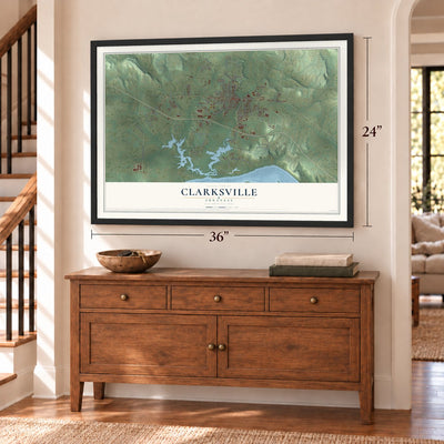 Clarksville, Arkansas map, 24 x 36 inch print in a black frame above a dresser by a staircase