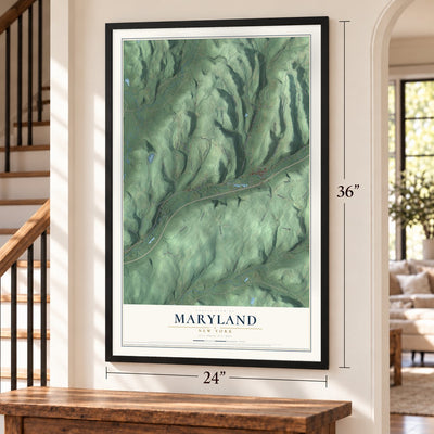Maryland, New York map, 24 x 36 inch print in a black frame by a staircase