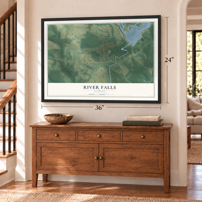 River Falls, Alabama map, 24 x 36 inch print in a black frame above a dresser by a staircase