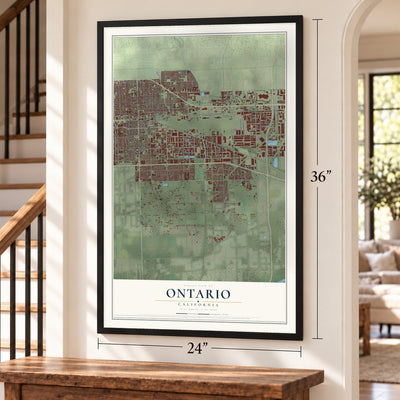 Ontario, California map, 24 x 36 inch print in a black frame by a staircase