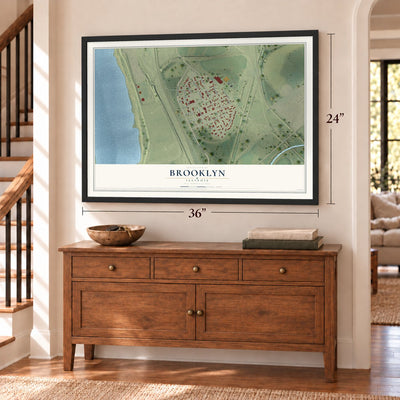 Brooklyn, Illinois map, 24 x 36 inch print in a black frame above a dresser by a staircase