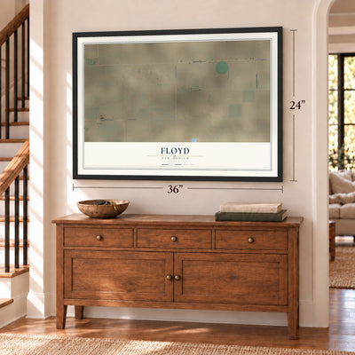 Floyd, New Mexico map, 24 x 36 inch print in a black frame above a dresser by a staircase