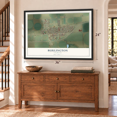 Burlington, Colorado map, 24 x 36 inch print in a black frame above a dresser by a staircase