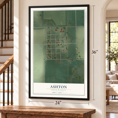 Ashton, South Dakota map, 24 x 36 inch print in a black frame by a staircase
