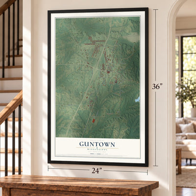 Guntown, Mississippi map, 24 x 36 inch print in a black frame by a staircase