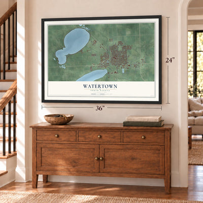 Watertown, South Dakota map, 24 x 36 inch print in a black frame above a dresser by a staircase