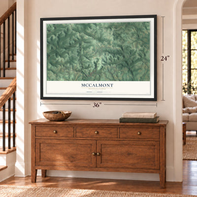 McCalmont, Pennsylvania map, 24 x 36 inch print in a black frame above a dresser by a staircase