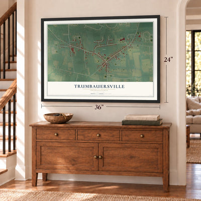 Trumbauersville, Pennsylvania map, 24 x 36 inch print in a black frame above a dresser by a staircase