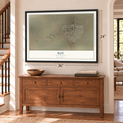 Roy, New Mexico map, 24 x 36 inch print in a black frame above a dresser by a staircase