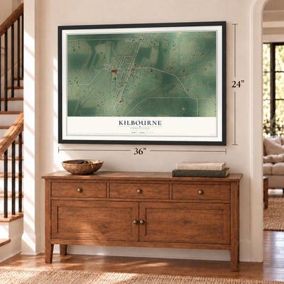 Kilbourne, Louisiana map, 24 x 36 inch print in a black frame above a dresser by a staircase