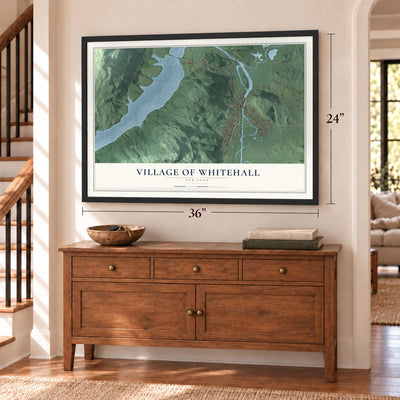 Village of Whitehall, New York map, 24 x 36 inch print in a black frame above a dresser by a staircase